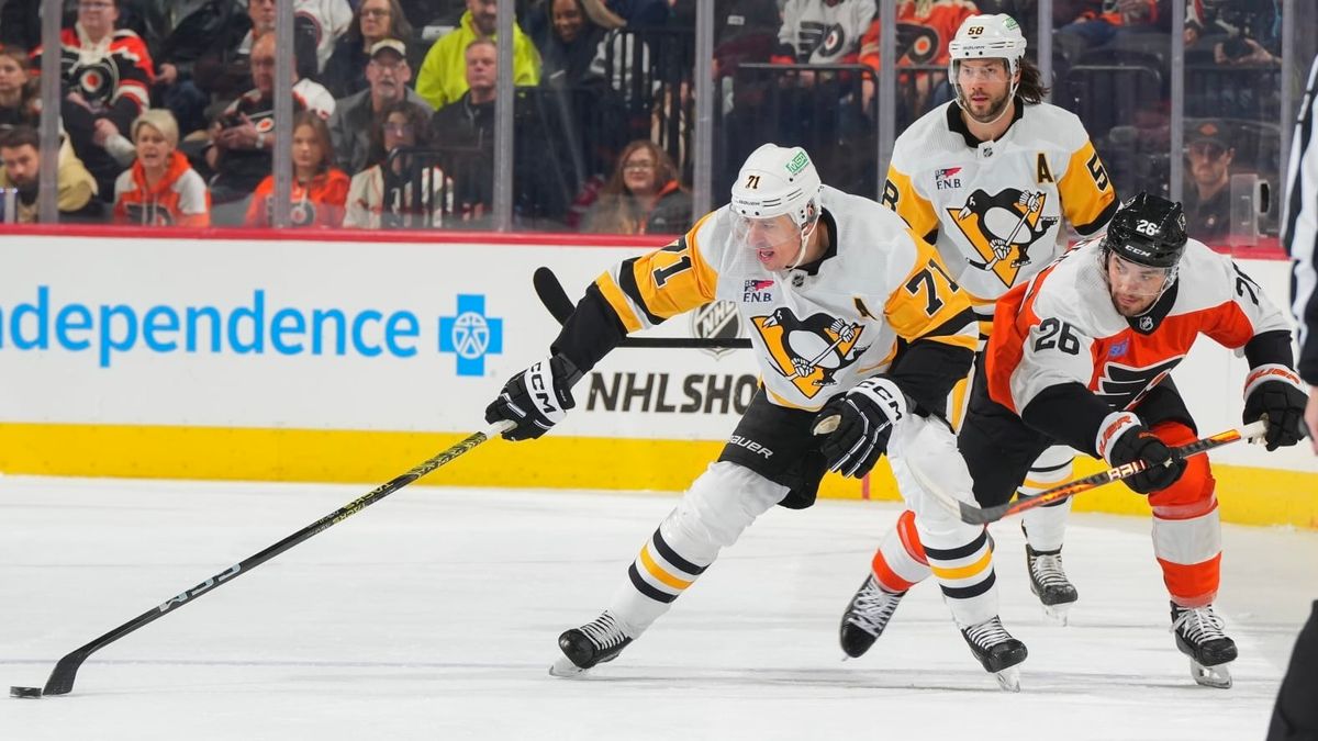 Evgeni Malkin skates with the puck Monday night in Philadelphia